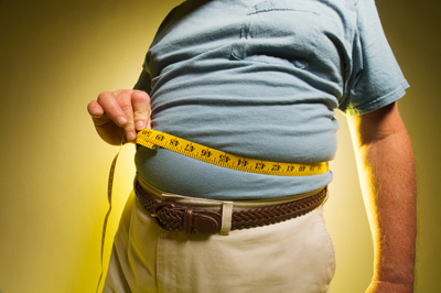 Man measuring his waist