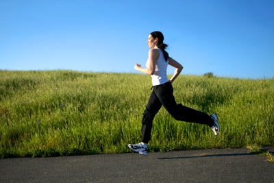 Mid adult woman running Mid adult woman running